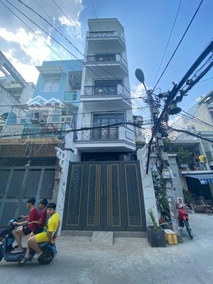 nhà mới 100% - 5 tầng -thang máy - ngay trung tam quận bình thạnh tphcm