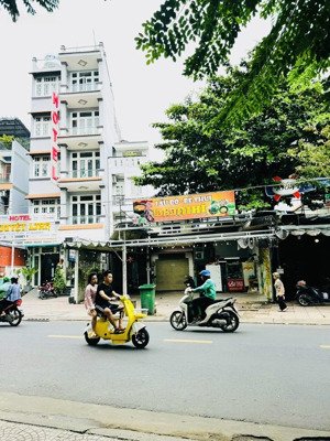 siêu phẩm nhà 2 mặt tiền kinh doanh - mt vĩnh khánh mặt tiền sau hẻm xe tải