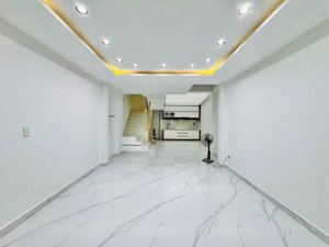 bán nhà 55m2 -ngay chợ gò vấp phường 4- sau lưng hẻm xe tải thông- ngang 5,2m nở hậu - xây mới đẹp