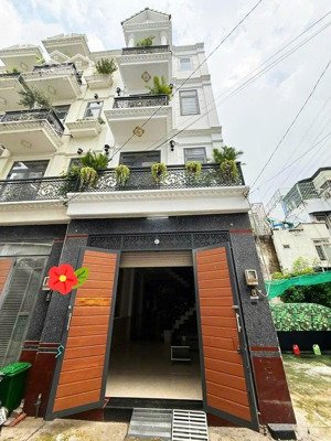 nhà 4 tầng btct vào ở ngay, 52m2, 4pn, 3wc, hẻm xe hơi, gần trường thcs trần quang khải