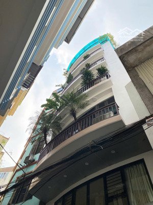 nhà trung tâm quận đống đa, gần vincom, 65m* 8 tầng thang máy, mặt tiền 7m, ô tô đỗ cửa kinh doanh