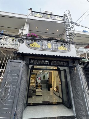 nhà mới đón tết- hẻm ô tô- 3 phòng ngủ rộng- đg phạm văn chiêu- đúc bê tông cứng cáp - nở hậu tài