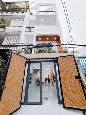 nhà sổ hồng riêng chính chủ - xe hơi đậu trong nhà - kế bên phú mỹ hưng - quận 7 - tphcm