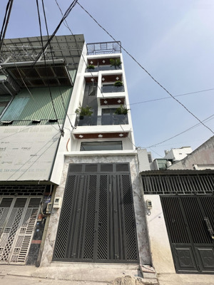 bán nhà 4x18m xây 4 tầng có thang máy mặt tiền đường nguyễn thị búp, phường tân chánh hiệp q12