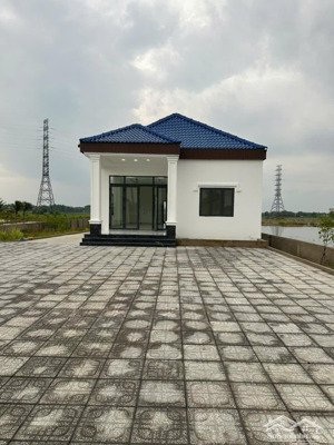 ngộp giảm giá! bán lô đất có nhà đẹp vừa xây mt cây trôm mỹ khánh, dt 1.991m2, có 197m thổ cư.