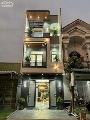 Nhà 1 trệt 2 lầu mới hoàn thiện - Đường D4 Khu Dân Cư Hồng Loan