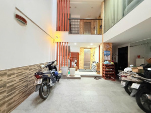 hẻm ô tô 5m diện tích hơn 100m 6 tầng thang máy gara riêng sát mặt tiền nơ trang long