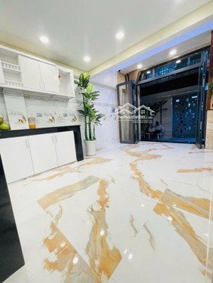 hẻm xe hơi nguyễn hồng đào,5 tầng,ngang 4m. giá 5,15 tỷ