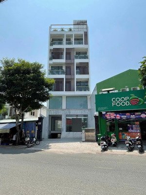 bán toà nhà 1200m2 , 1 hầm 7 lầu có thang máy mặt tiền đường trần thị cờ, p.thới an, q12. giá 35 tỷ