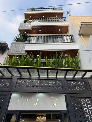 giảm giá nhà quận 1 90,6m2, đ. oto trần nhất duật, cho thuê 35tr, gần trung tâm y tế q. 1