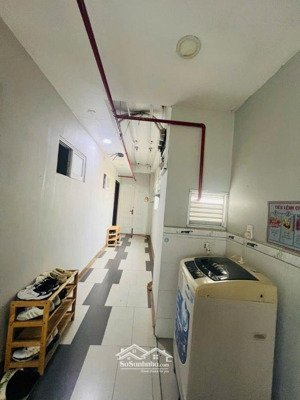 bán nhà 6 lầu kinh doanh căn hộ dịch vụ, đường bùi văn ba, dòng tiền trên 100tr/tháng, giá 26 tỷ tl