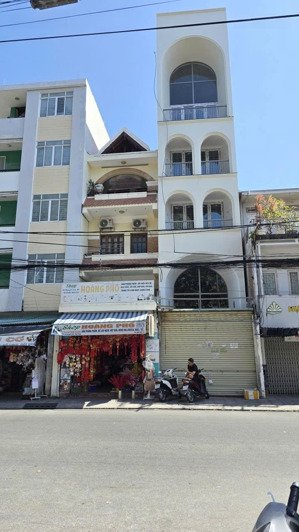 nhà 6 tầng mặt tiền nguyễn trãi - đối diện trường học âu cơ * cách biển trần phú: 900m.giá : 20 tỷ