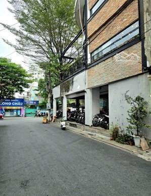 bán chdv phú nhuận, ngang 6m, xây 4 tầng, 15 phòng khép kín, đường thông xe hơi tránh