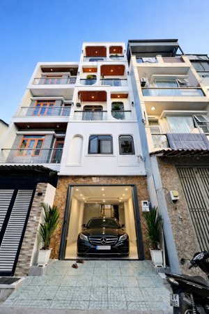nhà 2 mặt hẻm gò xoài - 4x18m - 5 tầng, có thang máy, nhà xe, gần lê văn quới - 8.46 tỷ