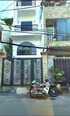 mặt tiền võ duy ninh ngay nguyễn hữu cảnh giáp q1. 6 tầng thang máy thu nhập 60tr/th.