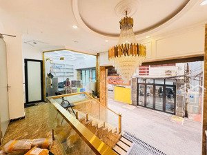 bán tòa nhà chdv võ chí công - lô góc, 176m2 - 9 tầng 76 phòng gara ô tô, dòng tiền ~ 5 tỷ/ năm