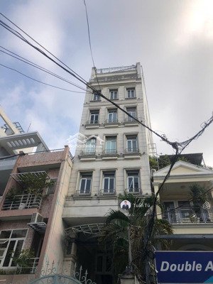 bán tòa nhà văn phòng mặt tiền bình thạnh - 9 tầng full pccc, thang máy, máy lạnh âm trần