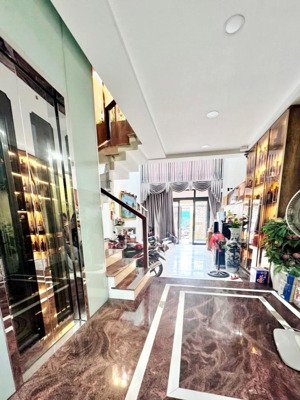 mặt tiền hẻm kdoanh nhà mới 4 tầng - 4.5x 20m - lê văn quới