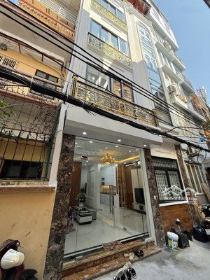 siêu phẩm chùa bộc 7 tầng thang máy nội thất cao cấp ngõ thông 58m2, mt 5m. giá 1x tỷ