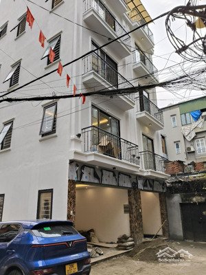 nhà phố hoàng hoa thám 35m 5 tầng thang máy ô tô đỗ cửa chạy quanh nhà ba mặt thoáng