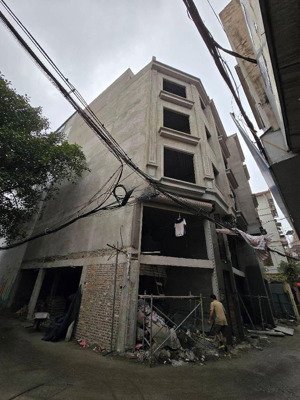 cần bán nhà gara ô tô lạc long quân 6 tầng, diện tích 58m2, có thang máy và thông ra võ chí công