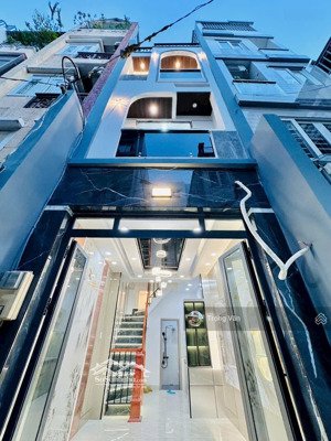 siêu phẩm 4 tầng lung linh - hẻm 3m sát cầu calmette đi bộ qua q1. chỉ 5 tỷ 590