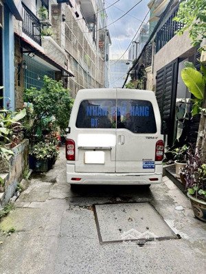 nhà 4 tầng btct, 60m2,ngay gần bến xe miền đông,qlộ 13.b.thạnh,xe hơi ngủ trong nhà,sổ a4,shr,4pn