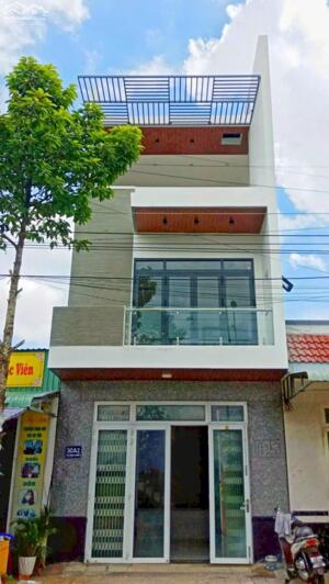 Nhà 2 lầu mặt tiền gần Bv Hoàn Mỹ