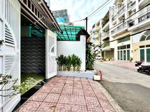 nhà mới 4 tầng hxh dương quảng hàm 5pn 6wc, có lề đường, giáp bình thạnh