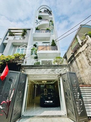 ô tô trong nhà bán nhà 6 tầng có thang máy dọn vào ở ngay giá 12 tỷ 9 tl