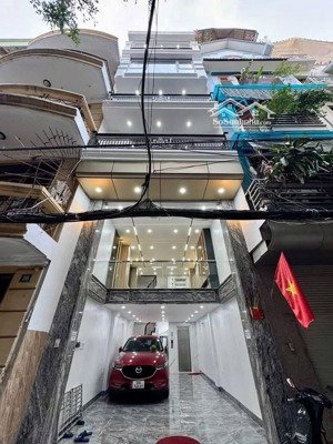 bán nhà phố chùa láng 50m2 -7 tầng thang máy, 2 mặt tiền,ô tô 7 chỗ vào nhà, gpxd-giá :19.x tỷ