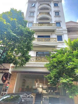 bán nhà mặt phố đê la thành 112m2, 9 tầng 1 hầm giá: 77 tỷ. ba đình