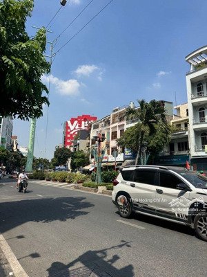 phan xích long phú nhuận nhà 4 lầu 12 phòng đường xe hơi 5.5m