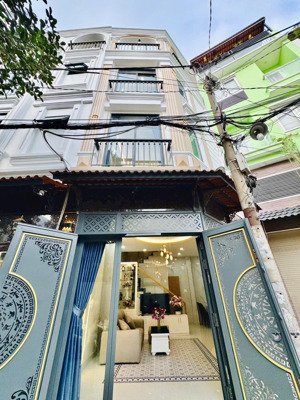 nhà mới,hẻm xe hơi lê quang định, 4 tầng,3pn,nở hậu 6,8m,giáp q1, phú nhuận