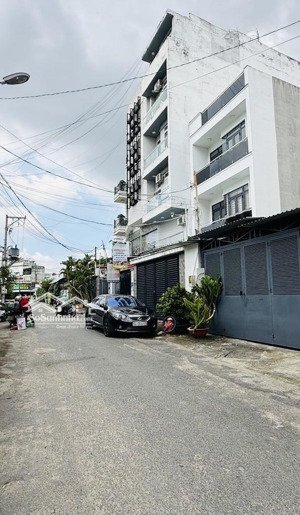 sát mặt tiền - ngay emart phan huy ích - 4 tầng kiên cố - dt 4.5mx14m - ô tô ngủ trong nhà