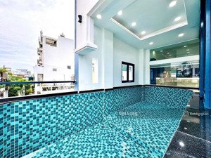 siêu phẩm mt trần hữu trang phú nhuận 4 tầng sẵn hầm xe hơi, thang máy, hồ bơi riêng. 16,5 tỷ