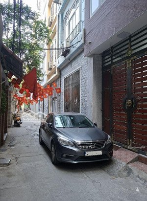 bán nhà cầu giấy - ngõ phân lô - ô tô đỗ cửa - 6 tầng nhà đẹp xách vali về ở - giá 10.6 tỷ