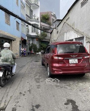 bán nhà mặt hẻm xe hơi thông tôn thất thuyết ngang 4m nở hậu