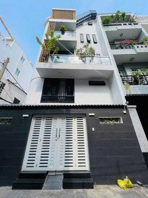 ngang 5m, hẻm xe tải trường chinh, dt 5x9m, 4 tầng nhà mới xây, cách mt 20m, chỉ 6,99 tỷ