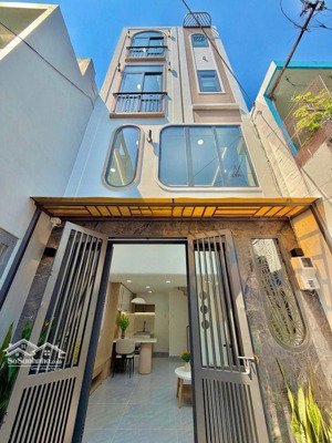 nhà mới xây 4 tầng-ngay cầu bông-bình thạnh cạnh quận 1,quận 3. sát đường trường sa-chợ bà chiểu