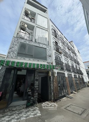 toà nhà mới ngay lê quang định, bình thạnh. có thang máy, hầm xe_ 4x12m (48m2)_ btct 5 tầng