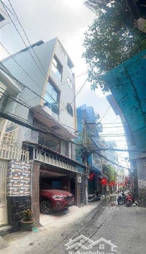 ô tô ngủ nhà khu phan xích long, 6.6x12m, 6 tầng với 9pn chdv, cho thuê khoáng 70tr/tháng