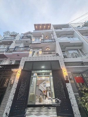 bán nhà mới- 4 tầng- hàng xóm q7- htp- hxh 6m- dt 4 x 12.5 - giá nhỉnh 7 tỷ- hoàn công- dân trí.