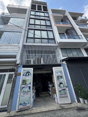 cho thuê tòa nhà 6 tầng thang máy hxh huỳnh văn bánh, phú nhuận (4.5x15m) giá 30 triệu