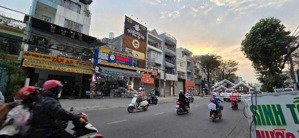 gấp bán - mặt tiền giá hẻm - nhỉnh 10t nhà mặt tiền đường 12m - 4 tầng mới - ngay quang trung gv.