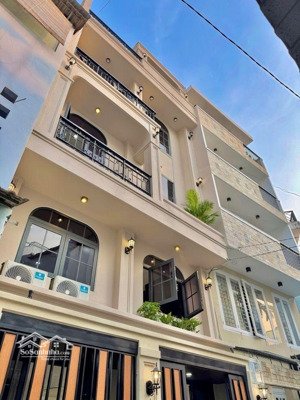 hẻm xe hơi thông -5 tầng -ngang 6m-khuvip phan đăng lưu -thích quảng đức. oi