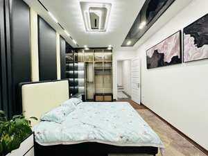 nhà mới 6t thang máy ô tô vào nhà. 50m2 x 6t - đường vào 5m - 2 mặt tiền. quận hbt hn