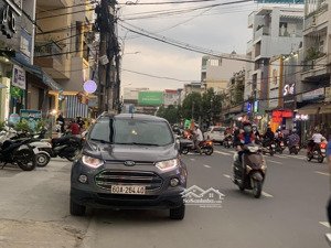 cần bán nhà mặt tiền kinh doanh đường phạm văn thuận gần chợ tân mai dt 14,5x31( nở hậu)