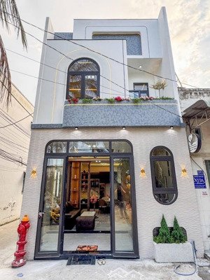 bán nhà trệt lầu mới 100% góc 2 mặt nhà gần chợ an bình , khu du lịch chợ nổi cái răng