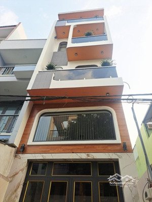 nhà mới 5 tầng full nội thất gara oto giá nhỉnh 8 tỷ gần lê văn quới hẻm 8m xe tải quay đầu